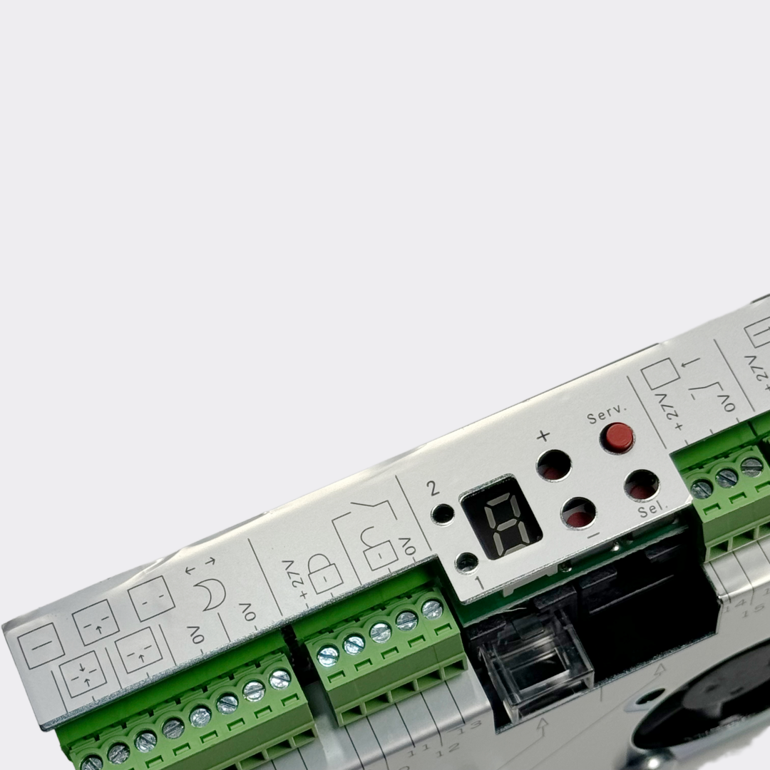 Close-up of Dorma ES200 controller BM model connection ports and DIP switches