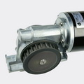 GEZE ECdrive SG80K planetary gearbox detail showing drive pulley and zinc die-cast reduction housing