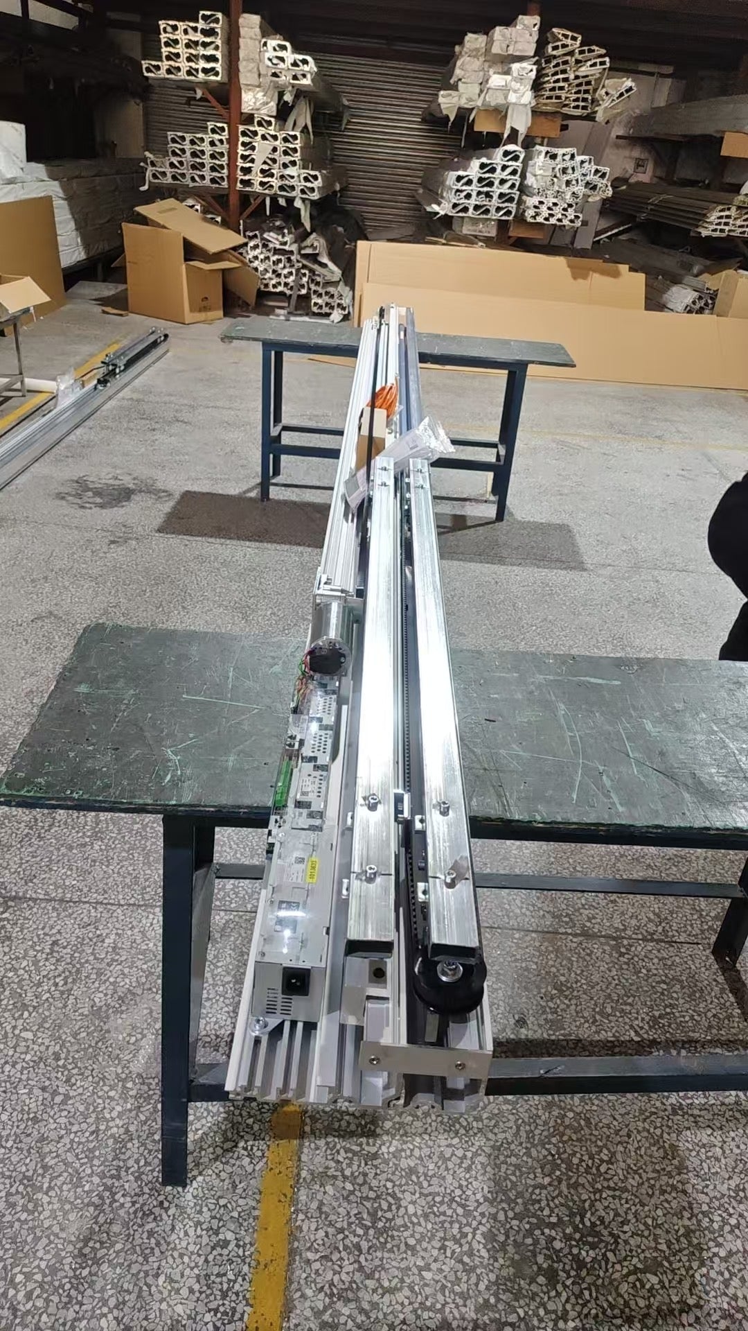 Complete OEM telescopic sliding door kit with controller on the factory floor
